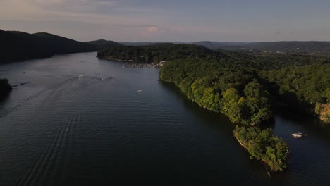 Aerial-video-of-boats-in-a-cove-on-candlewood-lake-enjoying-lakeday-in-danbury,-connecticut