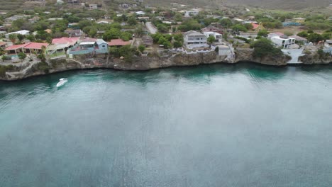 Aerial-trucking-shot-of-the-Lagun-in-the-Caribbean-with-clear-emerald-waters