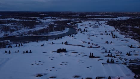 Aerial-view-of-nature's-beauty-of-frozen-river-and-fields