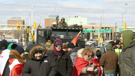 Protestors-and-police-at-Freedom-Convoy-at-Ambassador-Bridge,-Ontario