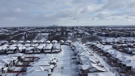 Aerial-view-of-a-suburban-community-in-Calgary,-Alberta-in-winter