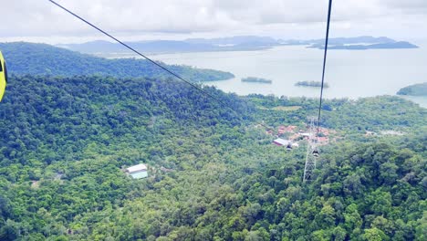 A-shot-of-the-cable-cars-moving-along-the-rope-over-the-mountain-in-Langkawi