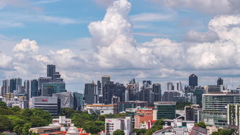 Skyline-of-downtown-Singapore-during-day,-white-clouds-move-overhead