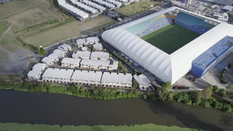 Housing-Complex-Next-To-Cbus-Super-Stadium-On-The-Banks-Of-Mudgeeraba-Creek-In-Robina,-Queensland,-Australia