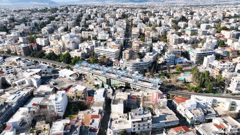 Drone-footage-around-the-metro-station-in-Marousi,-a-suburb-in-the-north-of-Athens,-Greece