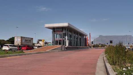 Public-Transit-buses-come-and-go-from-Racecourse-bus-stop,-Cape-town