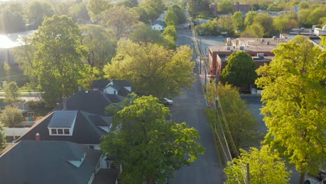 Aerial-above-street-in-residential-town-in-USA