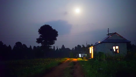 Rugged-Nepal-House-at-night-with-fire-flies-flying-around