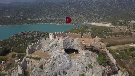 Ancient-fort-ruin-built-over-cave-on-stone-hilltop-in-southern-Turkey