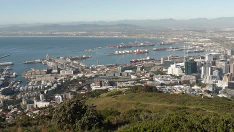 High-angle-pan-across-city-center-and-shipping-terminal-in-Cape-town
