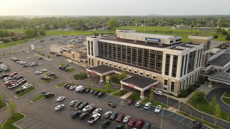 Beaumont-Health-Hospital-entrance-in-aerial-opening-shot,-Trenton-Michigan,-USA