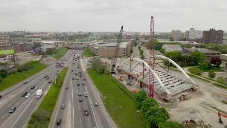 Second-Avenue-Bridge-being-constructed-on-the-side-of-I-94-freeway,-aerial-view