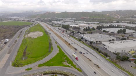 Aerial-View-of-I-5-Interstate-Highway-Traffic,-Santa-Clarita,-Los-Angeles-CA-USA