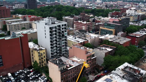 Drone-shot-revealing-a-Construction-site-at-a-train-station-in-Harlem,-NYC,-USA