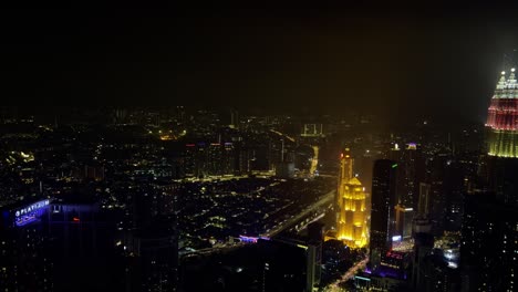 Una-Vista-Impresionante-De-Las-Luces-De-La-Ciudad-Por-La-Noche-En-Kuala-Lumpur,-Malasia