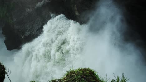 Nile-River-waterfall-with-water-mist-in-slow-motion,-Uganda,-Africa