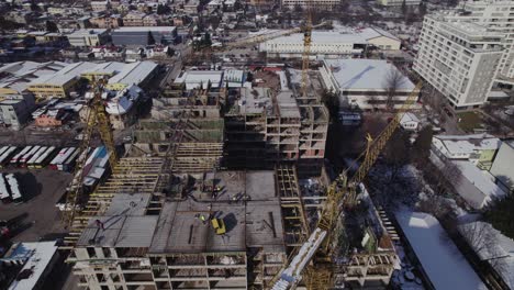 Aerial-view-of-construction-site-of-residential-building-in-the-winter