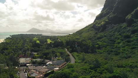 -Le-Morne-coastal-area-showing-the-beach-and-a-road-passing-between-resorts-and-a-mountain