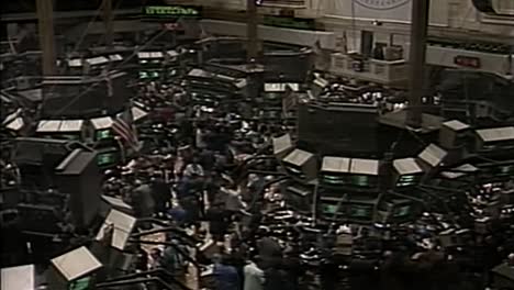 ZOOM-OUT-AND-PAN-FROM-STOCK-MARKET-EXCHANGE-FLOOR-IN-1992
