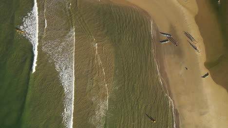 Timelapse-of-kayaks-on-shore-of-Playa-Grande-Beach-in-Uruguay