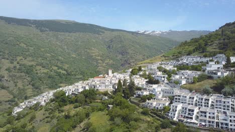 Aerial-view-of-the-village-of-Capileira-in-the-valley-of-Poqueira,-La-Alpujarra,-Granada,-Spain