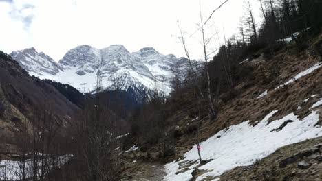 Dolly-Shot-along-a-tranquil-hiking-trail-in-the-pyrenees-mountains-near-Gavarnie,-France-in-Winter
