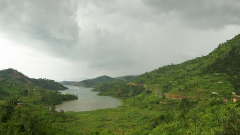 Camera-pans-left-of-lake-and-mountains-in-Rwanda