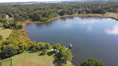 A-drone-shot-overlooking-a-lake-on-a-beautiful-day