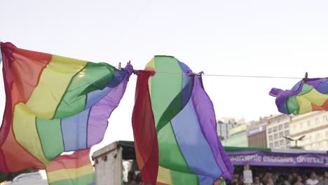 Close-up-shot-of-multicolored-flags-during-LGBT-in-Buenos-Aires,-slow-motion