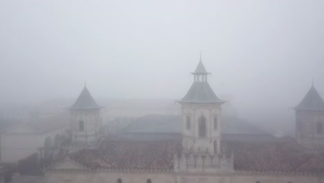 Facade-of-Chateau-Cos-d'Estournel-winery-shrouded-in-fog,-Bordeaux-in-France