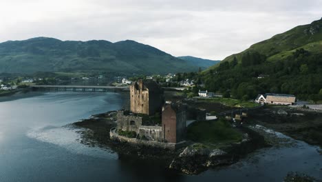 Orbiting-aerial-view-of-the-Eilean-Donan-Castle-in-Europe's-rich-countryside
