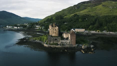 Drone-shot-pulling-away-from-an-ancient-abandoned-castle-in-Scotland