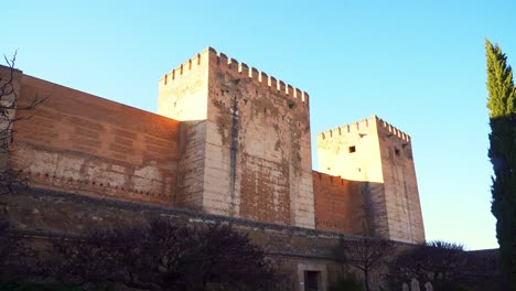 Exterior-walls-of-the-renowned-Alhambra,-a-palace-and-fortress-complex-located-in-Granada,-Andalusia,-Spain