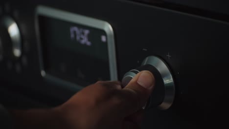 Hand-Adjusting-Temperature-Of-Air-Conditioner-By-Turning-Knob