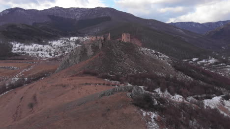 Trascau-Fortress-in-Coltesti,-Romania,-seen-from-a-drone-in-a-winter-day