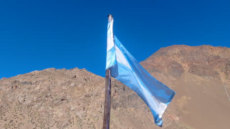 Argentinian-flag-by-Punta-de-Vacas,-the-starting-point-for-one-of-the-routes-to-Aconcagua