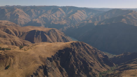 Landscape-aerial-moving-over-Hells-Canyon-Gorge-with-Snake-River-below