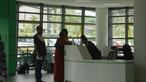 People-stand-in-silhouette-in-lobby-of-Rwanda-hospital
