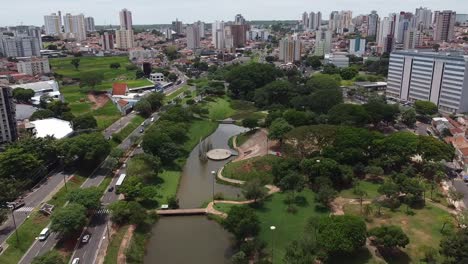Aerial-flying-over-Vitoria-Regia-Park-on-sunny-day,-Bauru,-Sao-Paulo,-Brazil