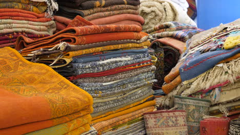 Piles-of-Persian-carpets-in-a-store