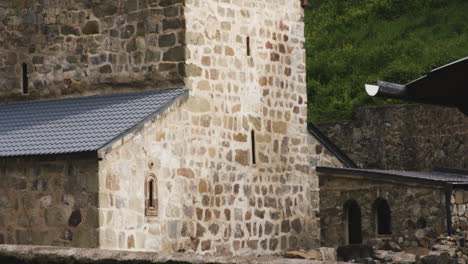 Monastic-church-of-Mtsvane-monastery-with-holy-cross-on-renovated-roof