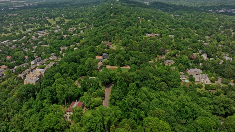 Birmingham-Alabama-Aerial-v36-cinematic-birds-eye-view-drone-flyover-redmont-park-wooded-residential-neighborhood-capturing-historic-century-homes-on-hilltop---Shot-with-Mavic-3-Cine---May-2022
