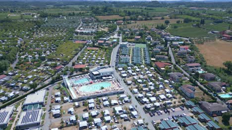 Aerial-video-around-the-pool-of-the-IdeaLazise-Camping-at-Lake-Garda-