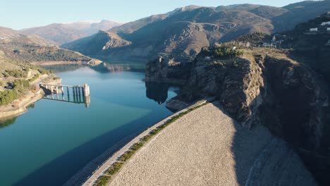 Aerial-view-of-the-dam-at-Embalse-de-Canales-in-Sierra-Nevada,-Spain