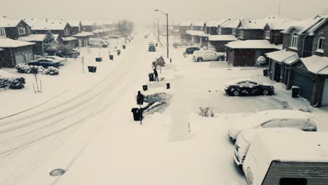 Drone-view-of-a-snowy-neighborhood
