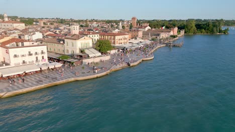 Touristic-Lakeside-Town-of-Lazise-on-Lake-Garda-Shore-in-Italy,-Aerial