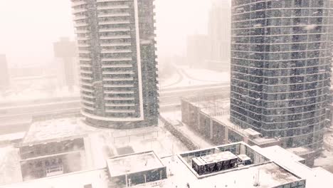 High-rise-commercial-buildings-during-a-snow-storm