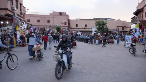 Slomo-shot-shows-market-square-activity-in-Marrakesh-medina,-Morocco