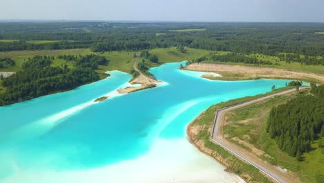 Drone-flying-forward-over-a-nuclear-poisonous-lake-near-Novosibirsk,-Siberian-Maldives,-Russia