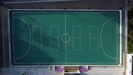 Empty-small-concrete-football-field-view-from-above